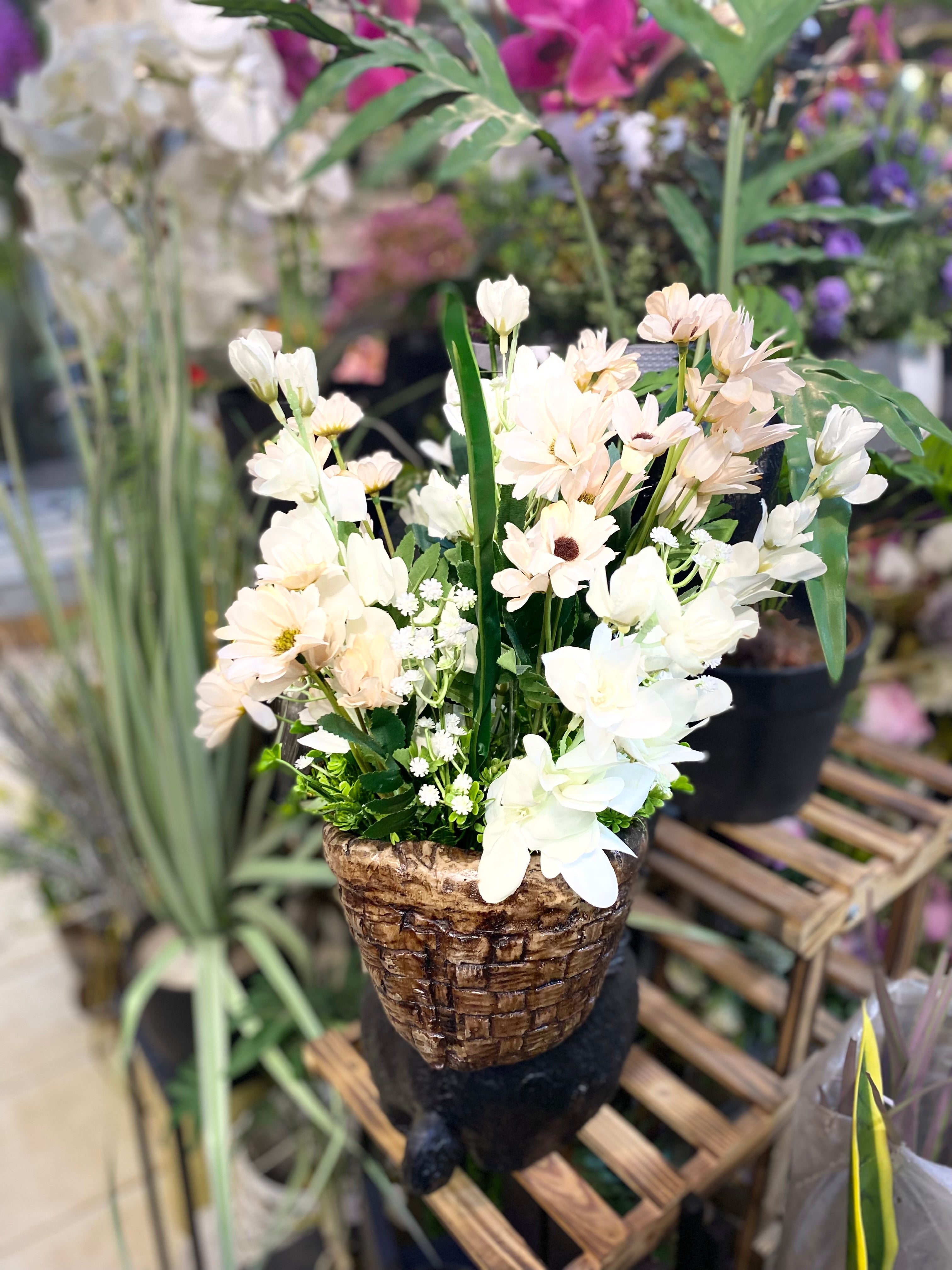 Outdoor Fiber Bunny with flowers