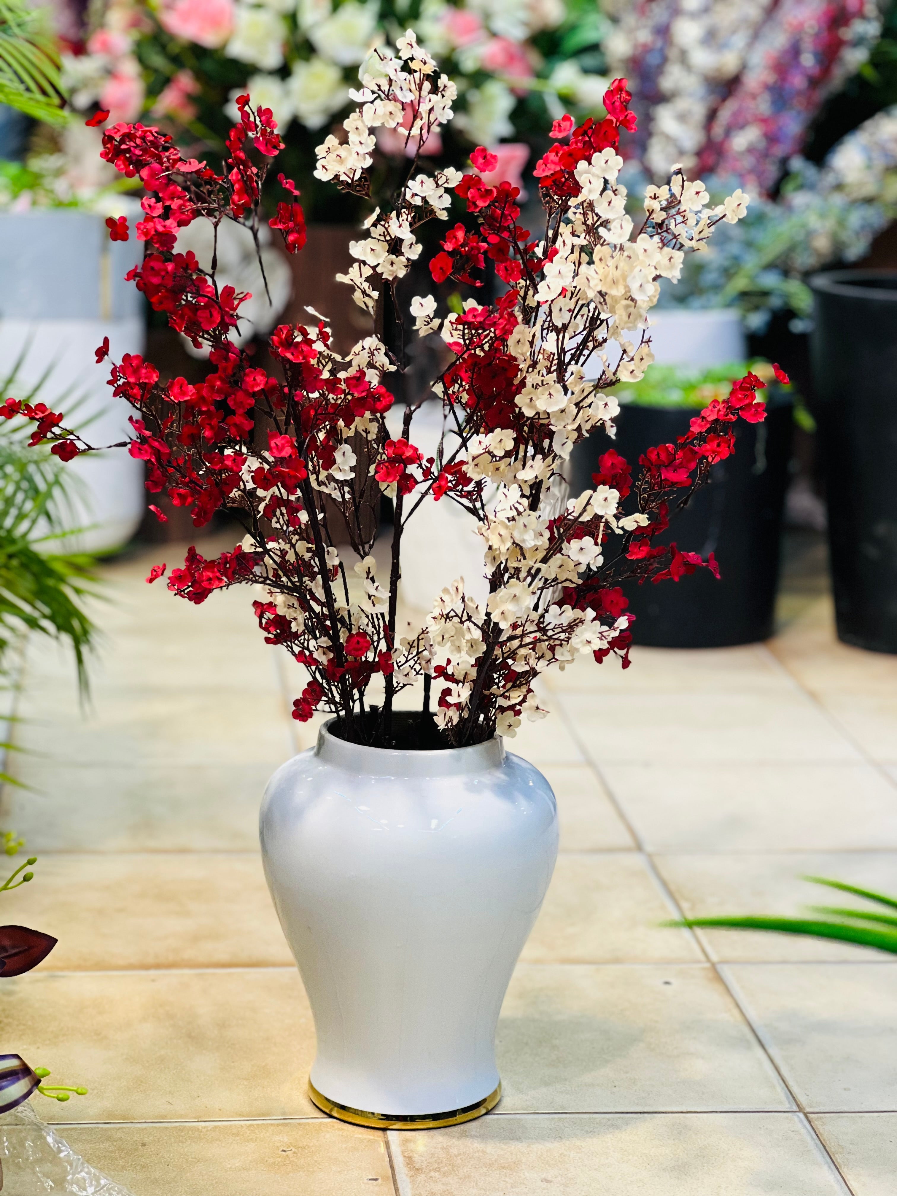 White urn with Gipso stems