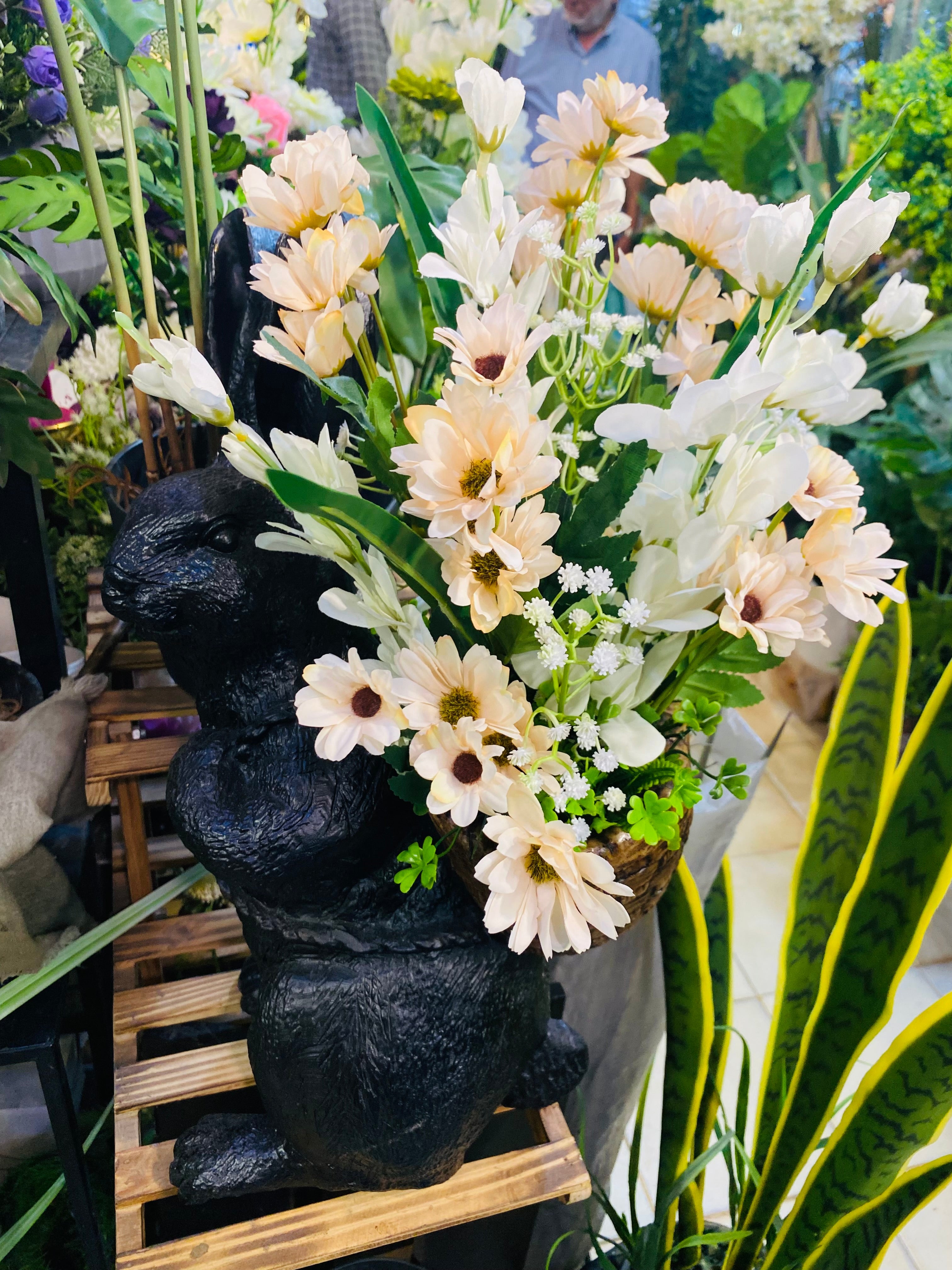 Outdoor Fiber Bunny with flowers