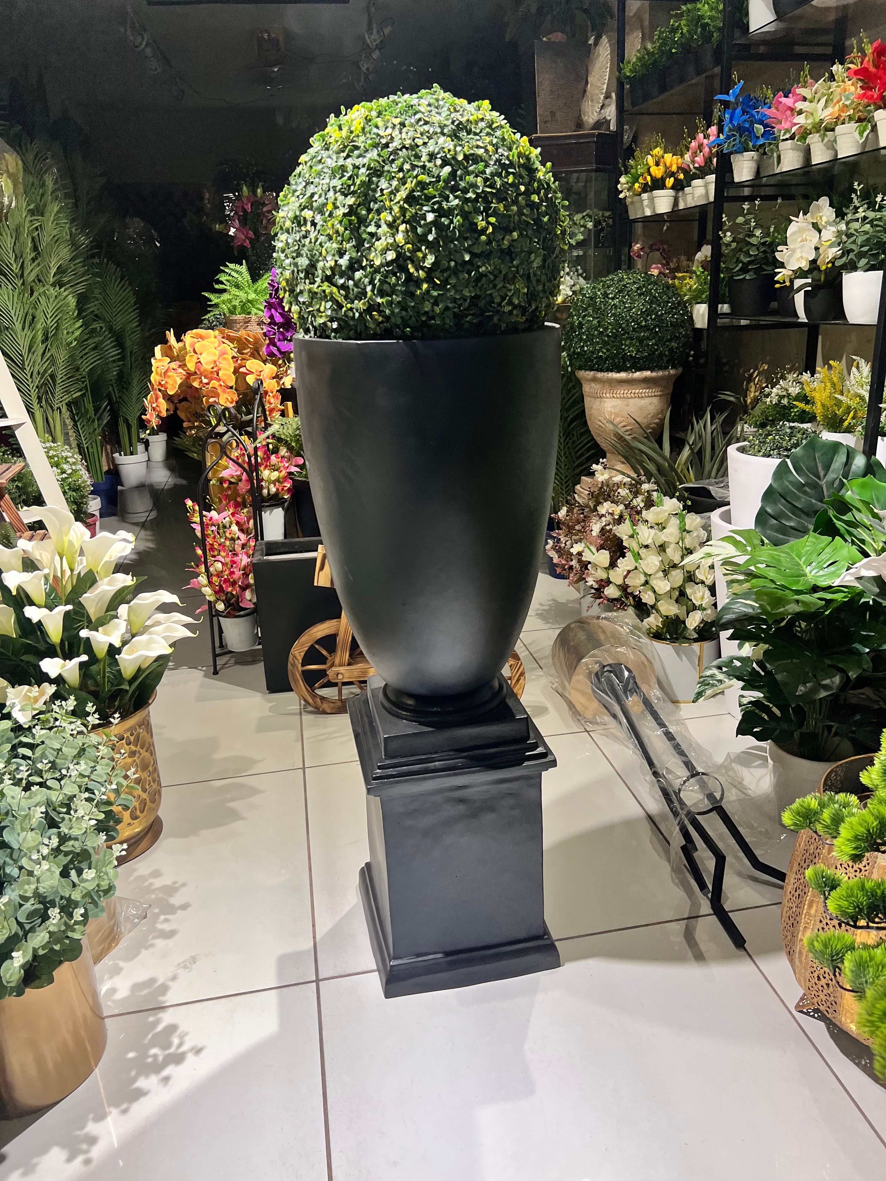 Black fiber urn with pedestal