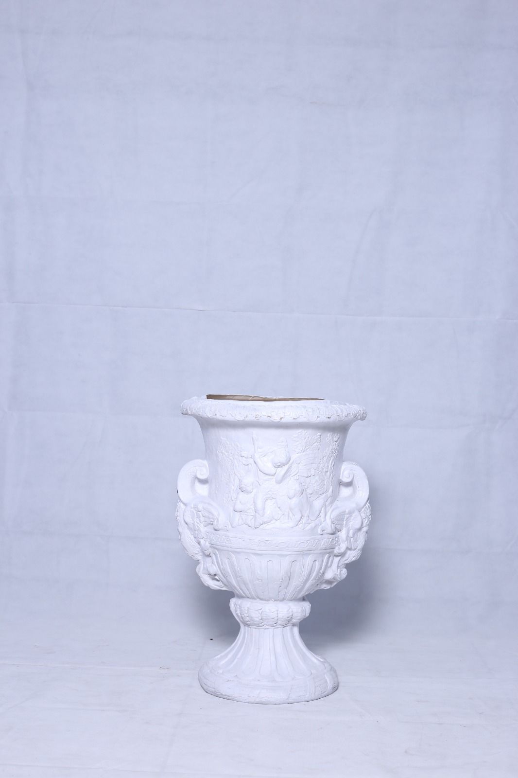 Carved urn 25”